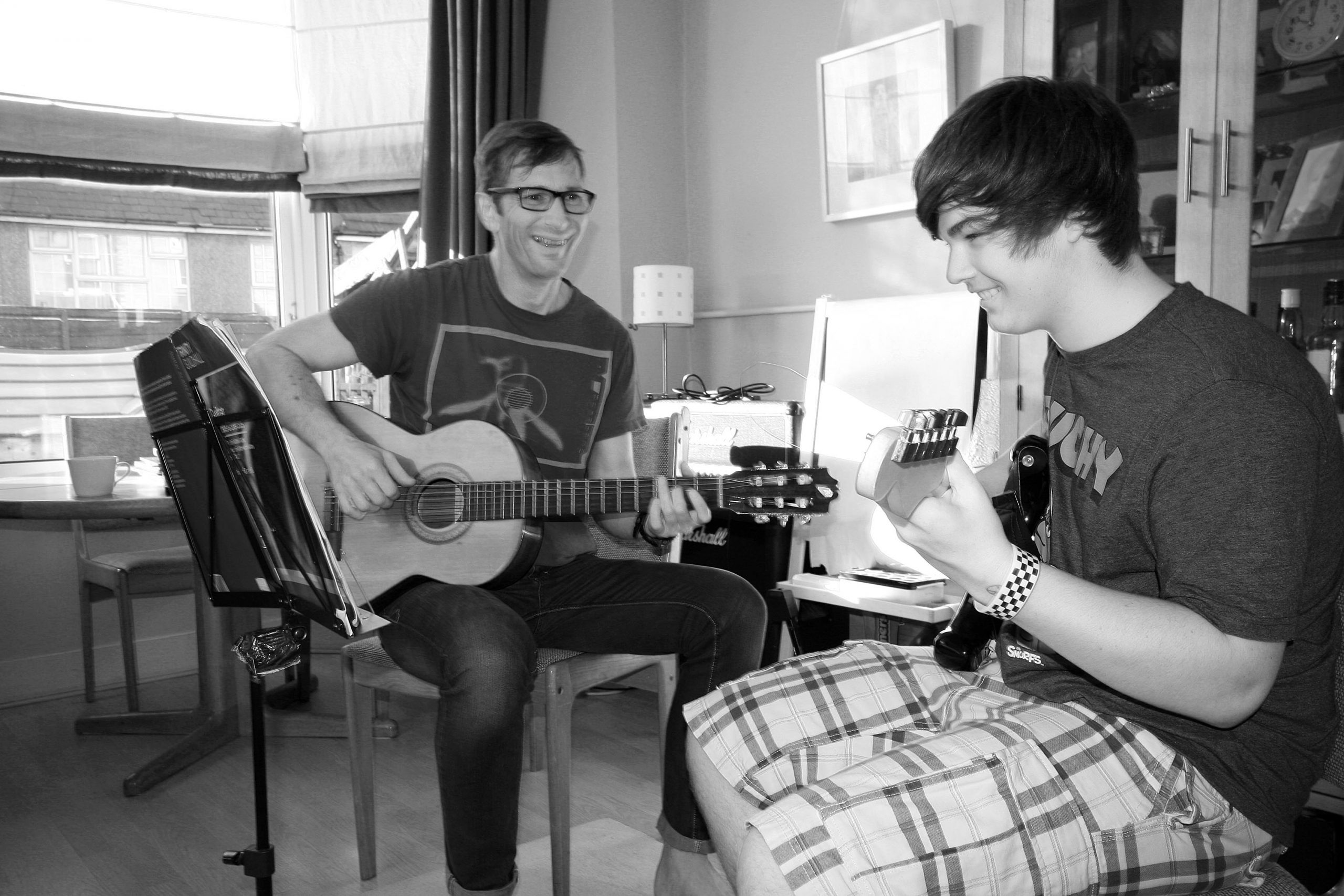 Richard and Alaister enjoying their guitar lesson in felpham